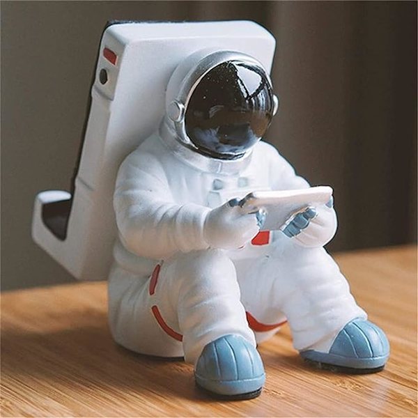 Kreativ universell astronaut telefonstativ (sittende stilling) skrivebord harpiks astronaut nettbrett iPhone telefonstativ deksel iPad astronaut telefon hjemmekontor