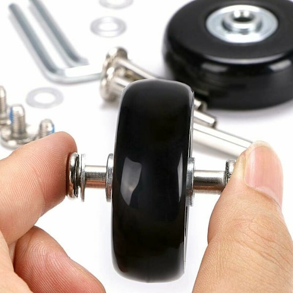 Set med 4 vridbara reservhjul i gummi för resväska, 45 x 18 mm