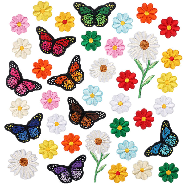 39 sommerfuglejernssyede tøjlapper, dekorativt broderi pa