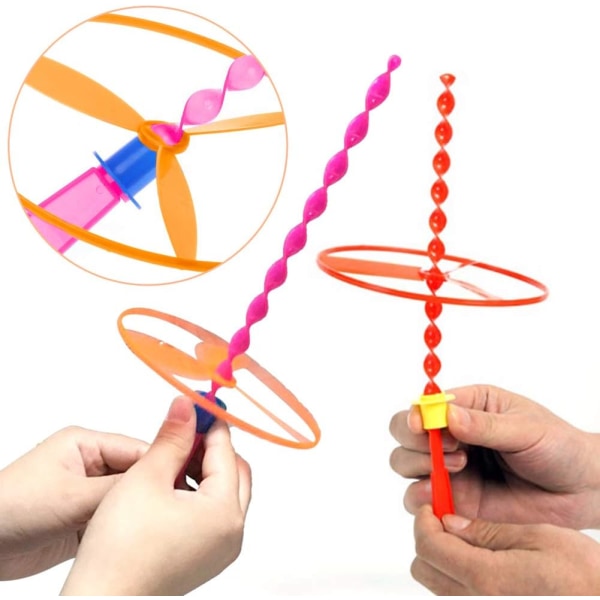 Random Color (4 kpl)-Twisty Pull String lentävät lautaset, jotka pyörivät F