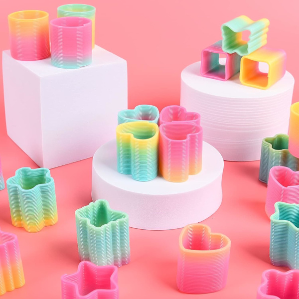 Regnbue spiralfjær, 48 stykker magiske fjærer, regnbue plast regnbueleker, mini fjærleker for jenter, gutter festdekorasjoner og rekvisita (48 stk)