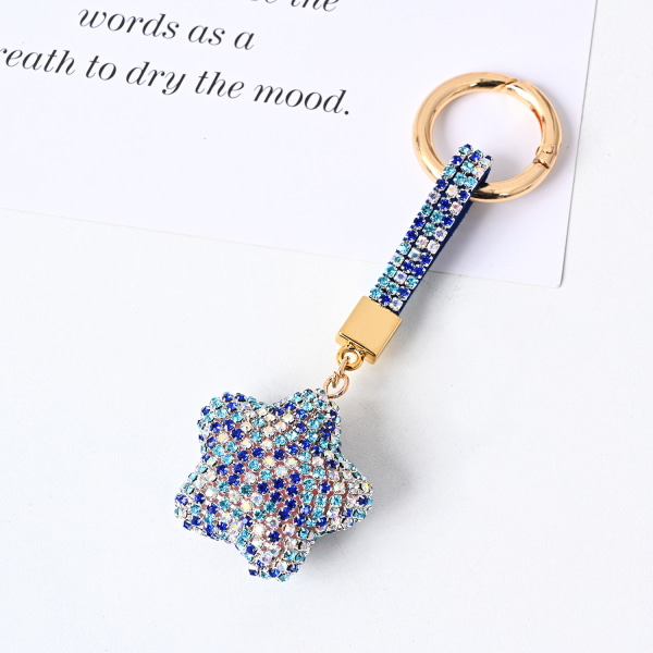 1 pakke Rhinestone stjerne nøglering med kvast Dame nøgleringe til tasker Charm pung vedhæng (tilfældig farve)