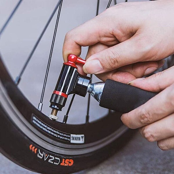 Pro Bike Tool Nopea ja Helppo CO2-pumppu - Sopii Presta- ja Schrader-venttiileille - Polkupyörän Rengaspumppu Maantie- ja Maastopyörille - Eristetty Holkki - CO2-patruuna
