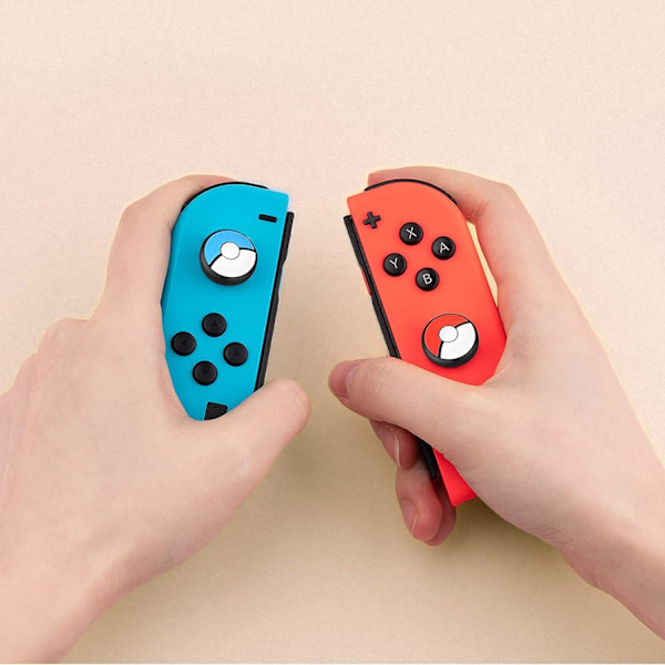 4 stk. - Røde og blå tegneseriekugler Beskyttende hætter til Switch / Switch Lite / Switch OLED Joy Con