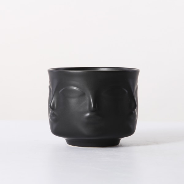 Sort dekorativ keramik skål med ansigtsmønster, smykkeholder a