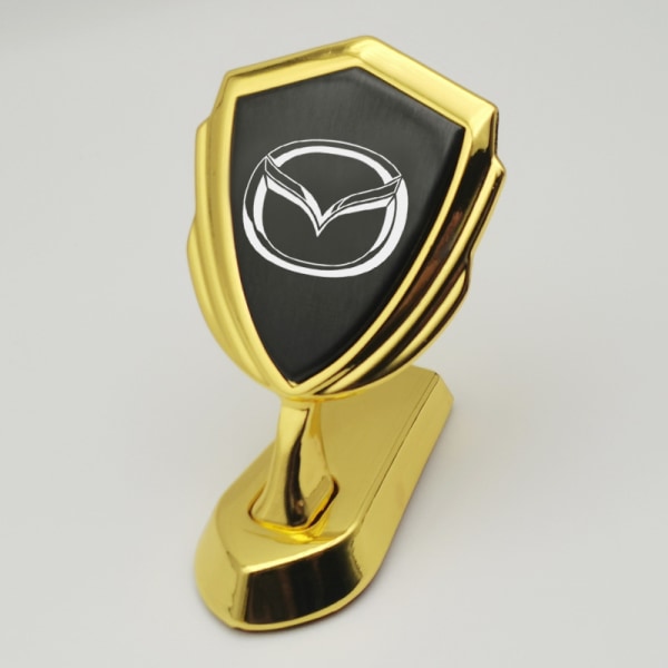 1 styk egnet til Mazda motorhjelm og logomærkat foran gold black