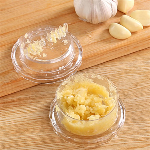 Arbeidsbesparende hvitløkspresse