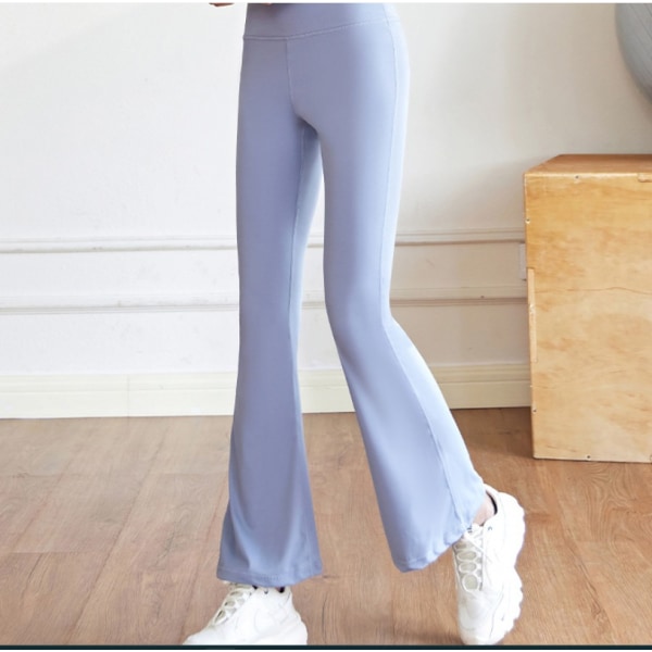 Magekontrollerende leggings med brede ben i kryss og midje
