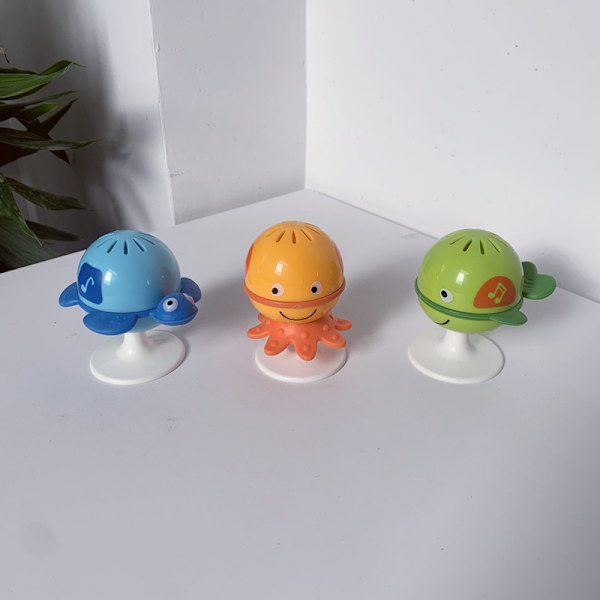 Intressant viskosring baby matstol barnvagn sugkopp skaller 0-1 år gammal baby djur hand skaller tredelad uppsättning av lugnande leksaker（ocean）