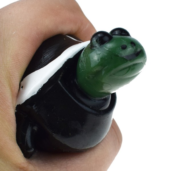 2 st gröna kreativa anti-stress dekompressionsleksaker Squeeze Toys Sjunkande sköldpadda med surfben pop-up dekompressionsleksaker Skedtrickgåva
