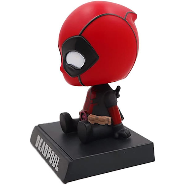 Hahmo bobblehead-nukke matkapuhelintelineellä/auton kojelaudan matkapuhelinteline punainen