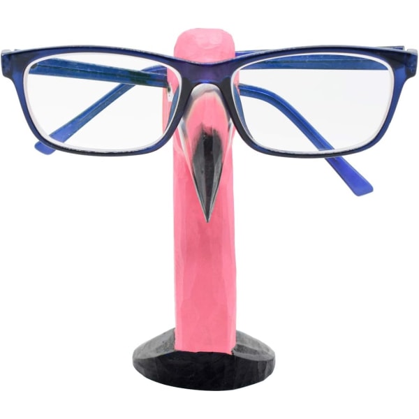 Utskårne brilleinnfatninger i form av et flamingo solglass