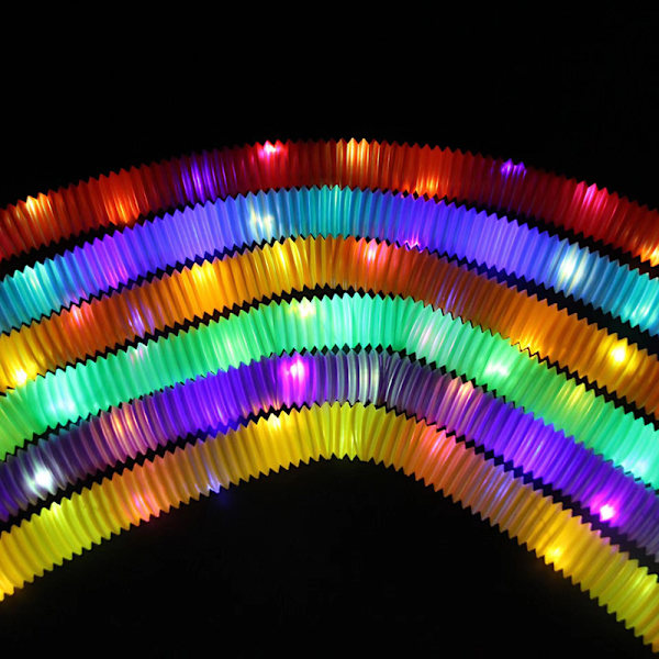 Uusi kuuma myyvä pop-putki, valaiseva teleskooppinen putki, LED-vilkkuva vesiputki, tuuletus- ja paineenpurkuharmonikka-lelu Rainbow colors 24 2.9cm