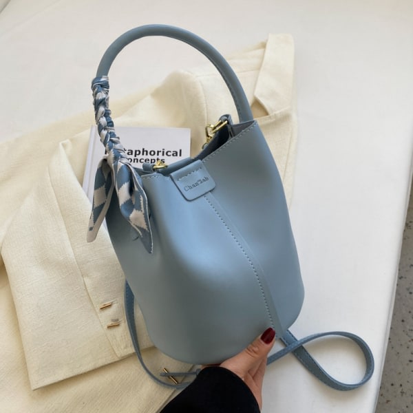 Hög kvalitet Texture Liten Väska Dam Sommar Ny Trendig Nisch Design Axel Crossbody Bag Texture Hand Bucket Bag Blå