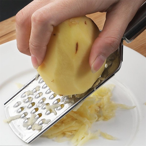 Handmatrivjärn i rostfritt stål Ost Parmesan Platt citronskal Bow Ginger Grater one-size