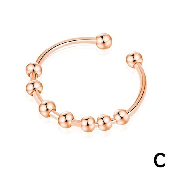 Rostfritt stål sju pärlor ångest roterande ring med justerbar Rose gold 1pcs