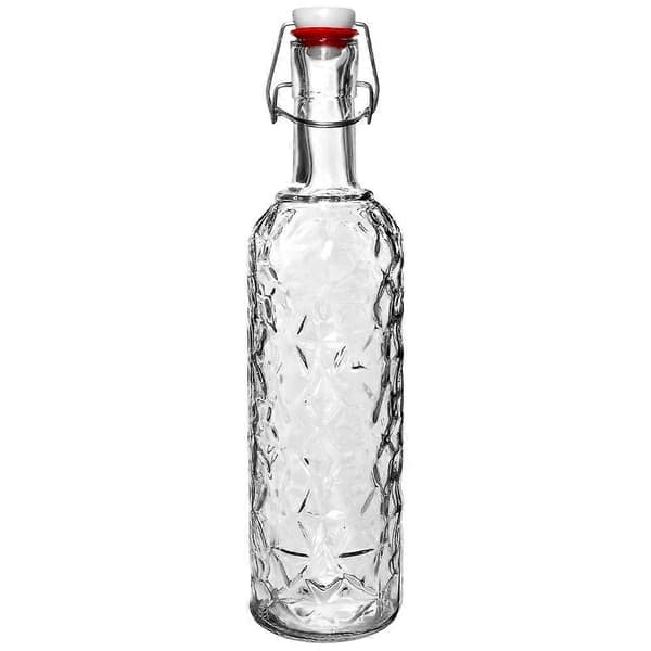 Vacker glasflaska med kork och klämma för drycker