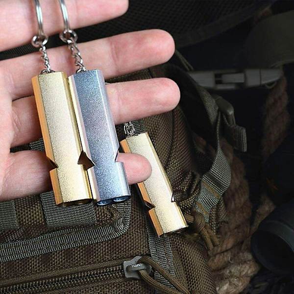 Tuomarin pilli, selviytymispilli, lapsen pilli, kaksoismetalliputket korkea desibeli avaimenperä pilli retkeilyyn, hengenpelastajaan, vaellukseen ja pelaamiseen