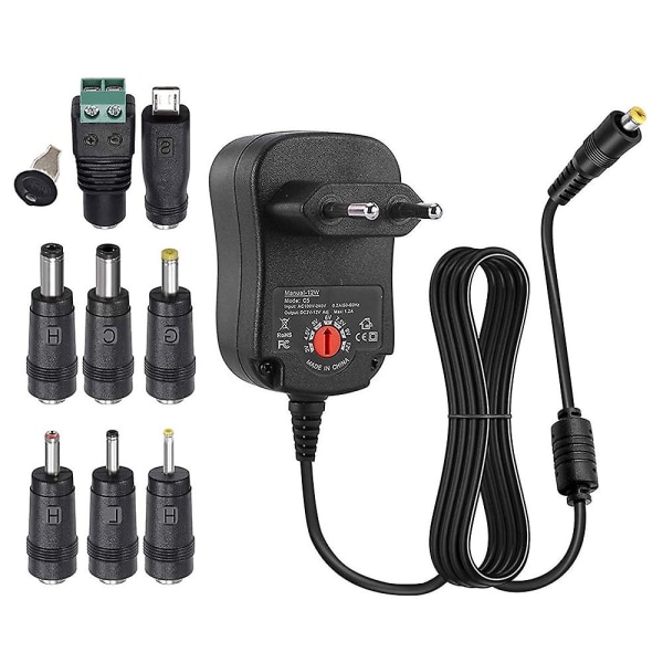 12w Universal Multi Voltage AC/DC Adapter Switching Power Supply med 8 valgbare adapterplugger, egnet for 3 V til 12 V enhet