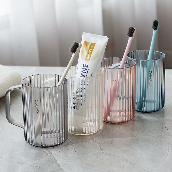 Sæt med 2 kopper og tandbørsteholdere 2 i 1 praktisk tandbørsteholder placeret på dit glas
