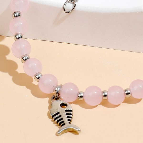 Ny trend koreansk version av nischdesign känsla rosa armband kvinnlig enkel pärlformad reflekterande fiskbensarmband