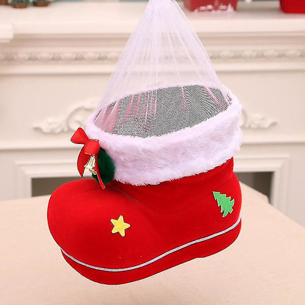 Jultomtens godispåsar i form av röda skor, julklapp, strumpa, heminredning