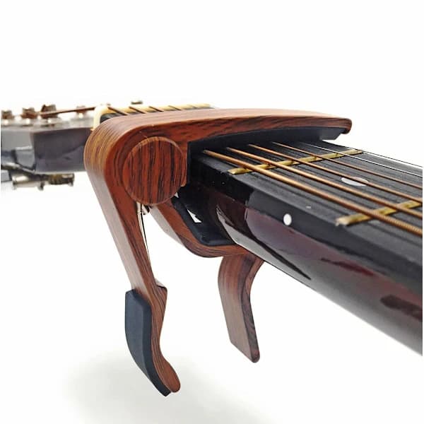 /EA/ Folkgitarrstämningsklämmor Ukulele stämningsklämmor Gitarrklämmor Capo