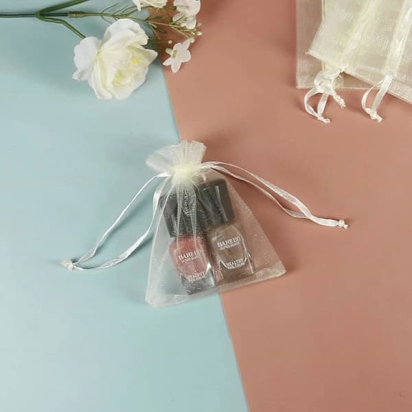 /EA/100 st beige organza smyckespåsar med dragsko