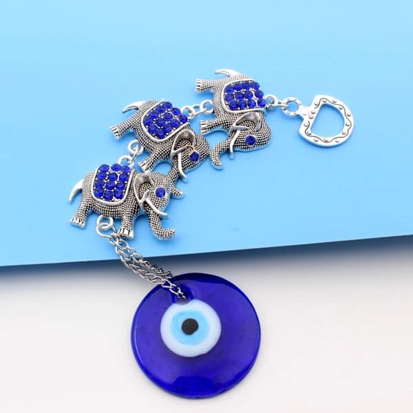 /EA/Hengende amulet dekorasjon Ulike former Blå, Metall, elefant