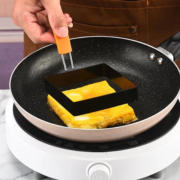 Eggform 4 stk Rustfritt stål 10x8cm med silikonhåndtak