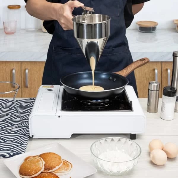 Røredispenser i rustfritt stål med stativ for kaker, smultringer, muffins, pannekaker