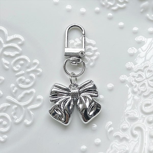 Fjärilsrosett Nyckelring Nischdesign Handväska Hänge Accessoar silvery Bow door buckle pendant