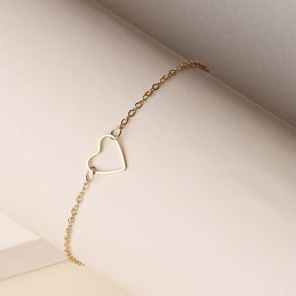 Snyggt och minimalistiskt urholkat hjärtaarmband Gold One size
