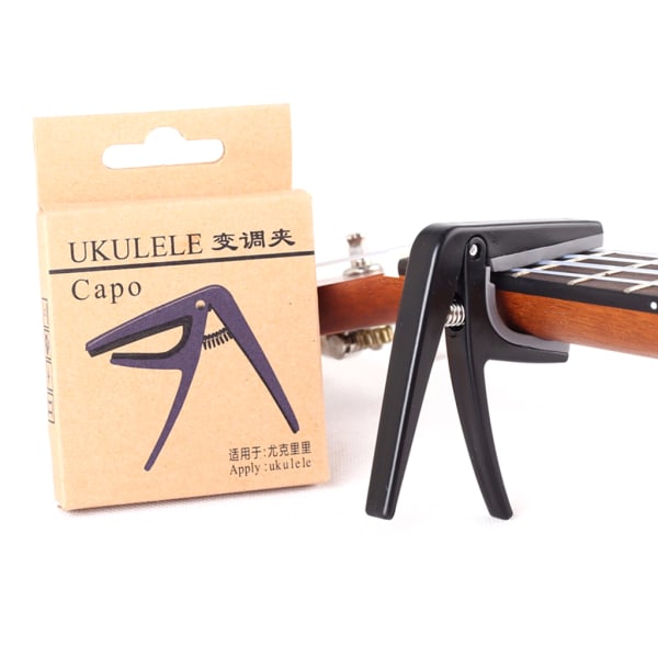 Professionell Ukulele Capo 4-strängad gitarrkapos Enhands snabbväxling Ukelele Capo gitarrdelar och tillbehör