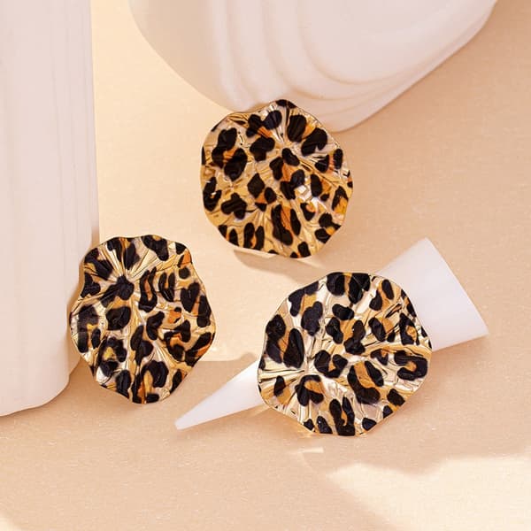 Stilfulde øreringe og ringe i legering med leoparddesign til festartikler