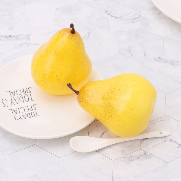 Konstgjorda päron med gren och gul hudsimulering falsk fruktprydnad för inredning i hemmet i sovrummet