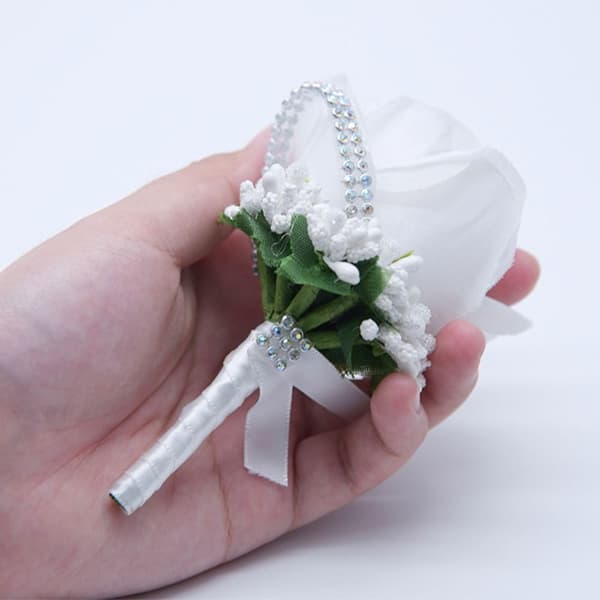 Brudgumsknapphålsblommor Bröllopsblommor champagne