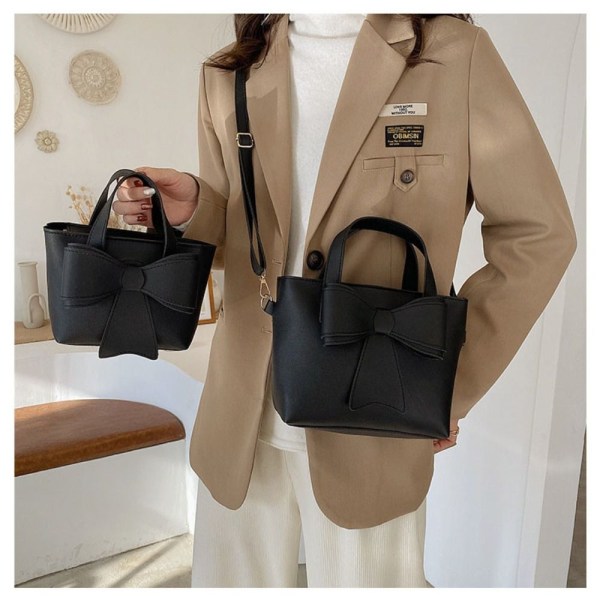 Liten skulderveske Bow Design håndvesker BRUN L brown L