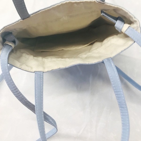 Brodeerattu kukkakiristysnyörilaukku Karkkilaukku 3 3 3