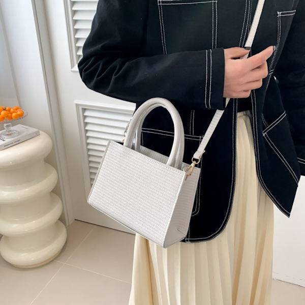Axelväska Väska i vävt mönster BEIGE Beige