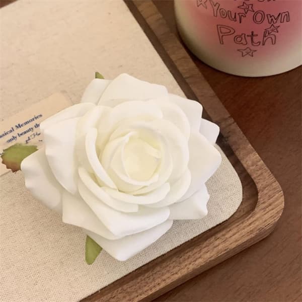 Blomsterhårklemmer Hodeplagg 9 9 9