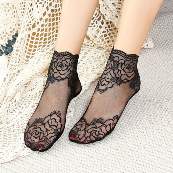 1pari läpinäkyvät sukat Invisible Ruffle Sock MUSTA BLACK