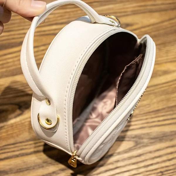 Pieni pyöreä laukku naisten olkalaukku BEIGE beige
