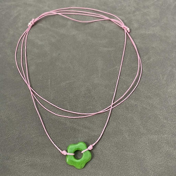 Tyylikäs solmittu kukka riipus kaulakoru ontto kukka riipus choker tytöille