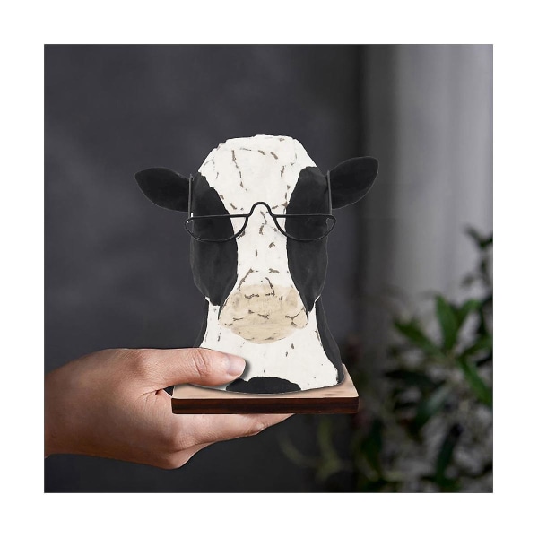 Eläinlasiteline Puinen härkälasiteline, lehmän pää, jolla on silmälasipatsaat, lehmän muotoinen lasiteline