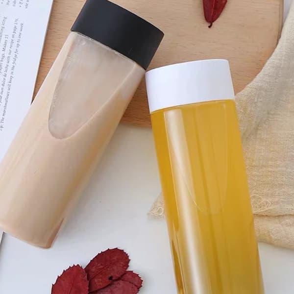 10 oz tomme plastik juiceflasker med sorte låg - 12-pak