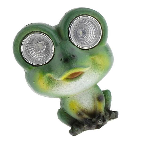 Hagefigur av harpiksfrø med solcellelys