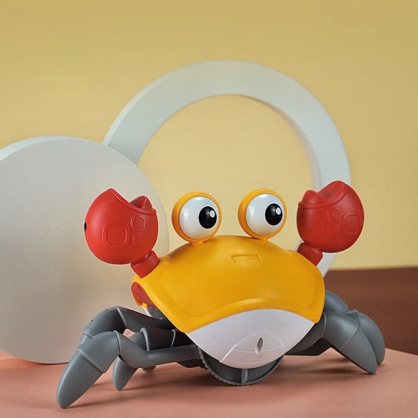 Krabbe Elektriske leker Blekksprut Sving til venstre Høyre Musikklys Automatisk induksjon Hindring Unngåelse Interaktiv robotkjæledyr for barn