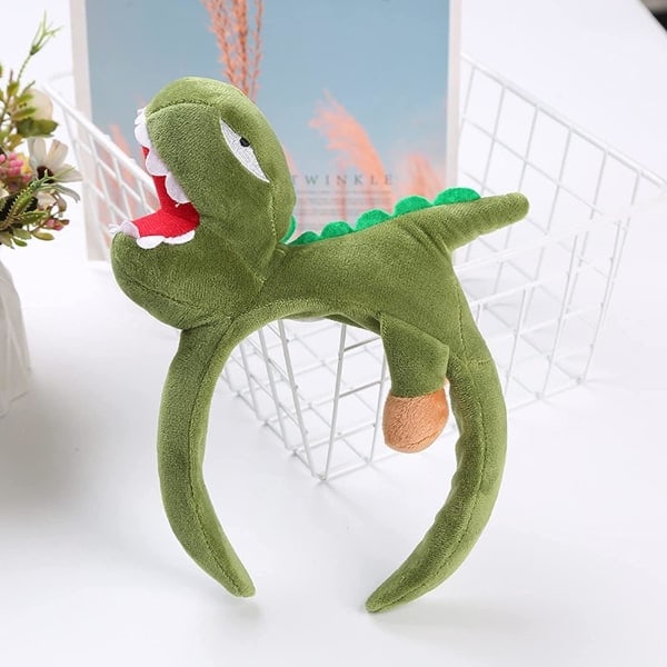 1 söt dinosauriehuvud-rosett