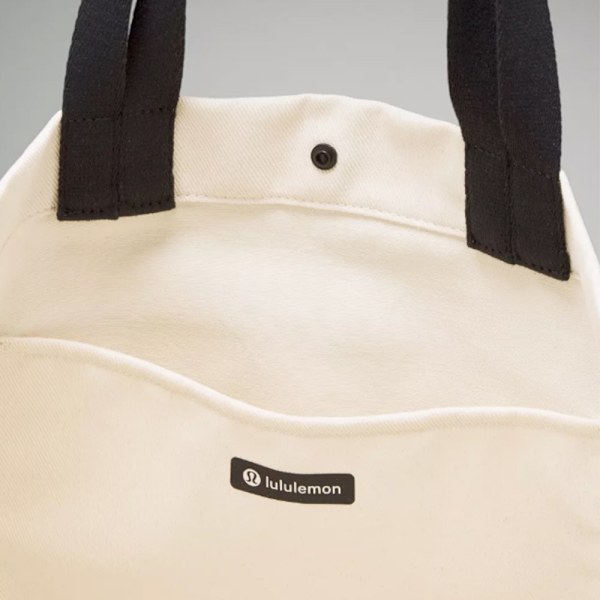 lulu Fashion Trendig Stor Kapacitet Lulu Canvas Tote Bag för Män och Kvinnor Studenter Resa Yoga Bag Fitness Sport Tote Bag Enkelsidig Axelväska White